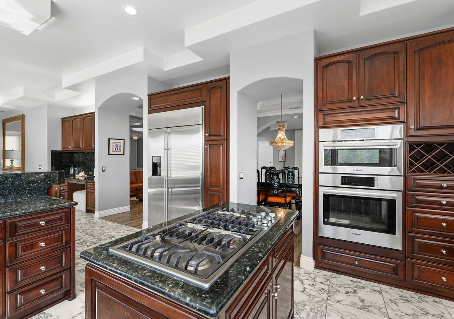 Chef's kitchen with gas cooktop island